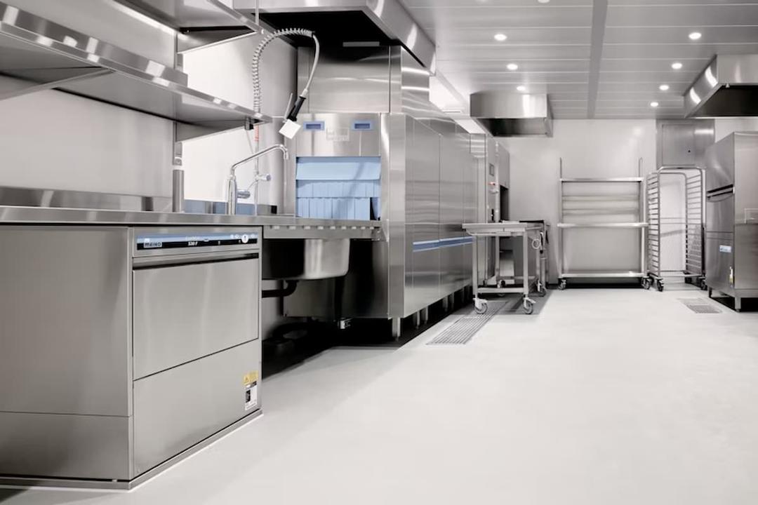 This image shows a Central Production Unit (CPU), a specialized, high-capacity kitchen facility designed for the large-scale preparation and processing of food items. CPUs are typically used by food service businesses